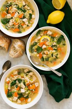 two bowls filled with chicken and vegetable soup