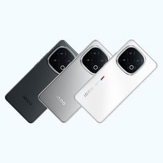 three new smartphones are shown in this image, one is grey and the other is white