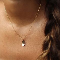 With a hammered oval charm pendant on our Narrow Links chain, the Olivia Necklace adds a touch of whimsy to any outfit. Want to create a set?! Pair this piece with our bestselling Olivia Ring! DETAILSPendant measures at 0.8"Available in 14", 16", or 18"Available in 14k Gold FillHypoallergenic, Nickel-Free, and Water Safe Yellow Gold Hammered Oval Link Jewelry, Hammered Yellow Gold Oval Link Jewelry, Dainty Oval Jewelry With Adjustable Chain, Yellow Gold Oval Link Charm Necklace, Minimalist Oval Pendant Jewelry With Charms, Delicate Oval Tarnish Resistant Jewelry, Everyday Oval Brass Jewelry, Minimalist Oval Recycled Gold Jewelry, Delicate Oval Tarnish-resistant Jewelry