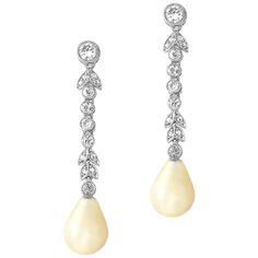 A pair of Edwardian pearl and diamond drop earrings, the natural saltwater drop shape pearls measuring approximately 11 x 8.3mm and weighing 4.28 and 4.73 carats, accompanied by a Gem & Pearl Laboratory certificate, suspended from an old- and rose-cut diamond-set foliate run, the diamonds all millegrain rubover-set in white, with screw fittings, circa 1910, the earrings measuring approximately 4 x 0.8cm, gross weight 5.49 grams. A Pair of Edwardian earrings in Good condition. Unmarked, metal tes Luxury Drop Pearl Earrings, Pear-shaped Diamond Earrings For Evening, White Gold Pearl Drop Pear-shaped Earrings, White Gold Pearl Drop Earrings In Pear Shape, Luxury Pear-shaped Pearl Drop Diamond Earrings, Luxury Pear-shaped Pearl Earrings, Classic Teardrop Diamond Pearl Earrings, Classic Diamond Teardrop Pearl Earrings, Teardrop Diamond Pearl Earrings For Evening