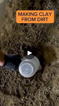 a person is digging in the dirt with a plastic bowl on their feet and an orange sign that says making clay from dirt