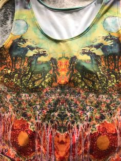 "Featuring my original batik Horses in the Moon, this equine inspired item of clothing is a comfortable fit and very stylish! Order a body hugging fitted tank top or a relaxed loose fitted one! Choose from regular (21.5\"-22.5\") or long fit (24\"-25\"). Pictured in regular fit. Choose the length you like! At this time only a large regular fitted tank is available. Choose a size up if you are in doubt! L (12-14) for 40\" bust, 31\" waist, 42\" hips * Custom made just for you, printed and sewn by Green Digital Print Top For Summer, Casual Printed Tank Top For Festivals, Casual Printed Festival Tank Top, Summer Tie Dye Tops With Batik Print, Green Batik Print Top For Summer, Casual Sleeveless Top With Abstract Print, Multicolor Batik Print Summer Top, Multicolor Batik Print Top For Summer, Summer Festival Top With Batik Print