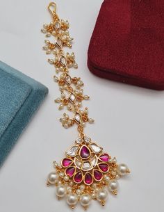 Ruby Kundan Maang Tikka/ Ruby Kundan Bollywood Sabyasachi MaangTikka/ Golden MaangTika/ Rajwadi Mang Tika/ Bridal Jewelry Length: 4.5" Made in Brass with 22 karat gold finish Lightweight Jewelry Suitable for any traditional attire Made with very high quality Kundan Stones and Pearls Facebook: www.facebook.com/shoparyafashions Pinterest: www.pinterest.com/aryafashions Instagram: www.instagram.com/shoparyafashions Twitter: www.twitter.com/aryafashions Email: info@aryafashions.com Pink Tilla Dupatta For Diwali, Pink Traditional Wear With Latkans For Puja, Traditional Pink Tikka With Tilla, Traditional Tikka With Dupatta For Festivals, Traditional Festive Tikka With Dupatta, Traditional Festival Tikka With Dupatta, White Tikka With Motifs For Diwali, White Motif Tikka For Diwali, Traditional Pink Dupatta With Latkans