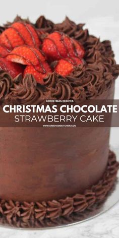 a chocolate cake with strawberries on top and the words christmas chocolate strawberry cake above it