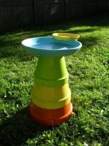 an image of a table made out of plastic cups on the grass with facebook caption