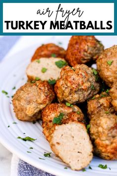 turkey meatballs on a white plate with parsley in the middle and text overlay