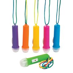 several different colored plastic bottles with string attached to them