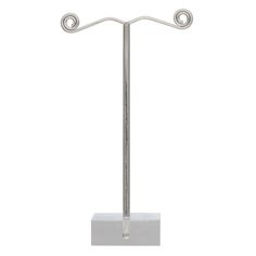 a metal pole with two hooks on it and a square base in the middle,