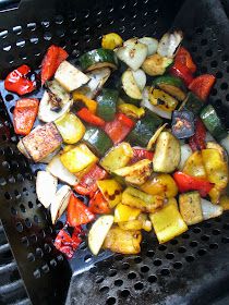 the vegetables are being cooked on the grill