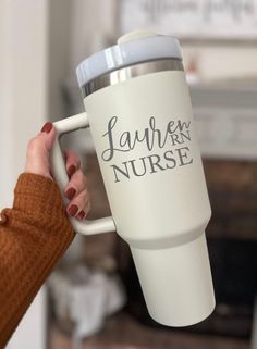 Celebrate the dedication and hard work of nurses with our personalized Nurse Tumbler, the perfect Nurse's Week gift that also suits any nurse appreciation event, nursing student milestone, or nurse graduation. Crafted with care, this custom RN gift is designed to honor the incredible commitment of nursing professionals everywhere. Our Nurse Appreciation Gift Tumbler is not just a token of gratitude; it's a daily companion for the hero who wears scrubs. Made from durable materials, it's ideal for Graduation Cup, Nurse Things, Graduation Cups, Nurse Tumbler, Professional Nurse, Nurses Week Gifts, Nurse Week, Long Sleeve Baseball Tee, Nurse Appreciation Gifts