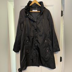 Stylist Black Raincoat New No Tag Size L Calvin Klein Solid Color Spring Outerwear, Calvin Klein Black Spring Outerwear, Calvin Klein Black Outerwear With Pockets, Calvin Klein Spring Outerwear With Button Closure, Athleisure Jacket, Black Raincoat, Faux Fur Sweater, Fur Sweater, Calvin Klein Red