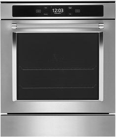 a stainless steel oven with the door open