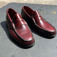 Brand New Burgundy Penny Loafers Shoes Great Shape No Damage Brown Loafers With Red Sole And Round Toe, Burgundy Slip-on Loafers For Business, Classic Burgundy Loafers With Rubber Sole, Classic Loafers With Red Sole For Business, Classic Business Loafers With Red Sole, Casual Slip-on Goodyear Welted Moccasins, Classic Round Toe Boat Shoes For Fall, Classic Red Tassel Loafers For Business, Classic Leather Shoes With Red Sole For Work