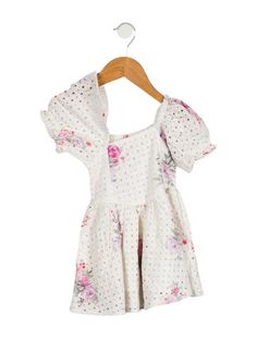 Toddlers' white, pink, and multicolor LoveShackFancy short sleeve dress with floral print, eyelet rim, ruffled trim, and elasticized closure. Size 2-3Y. Hand wash cold. Dress With Floral Print, Floral Short, Short Sleeve Dress, Ruffle Trim, Sleeve Dress, Print Patterns, Short Sleeve Dresses, Floral Print, Size 2