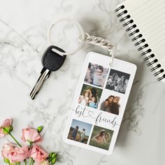 a keychain that has photos on it next to flowers and a notepad