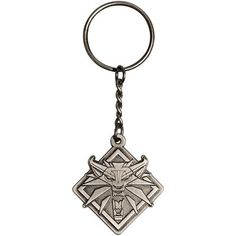 a metal key chain with an animal head on it