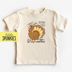 Vintage Turkey Shirt, Turkey Gravy Beans Rolls Let Me See That Casserole Kids Shirt, Fall Foods, Toddler Natural Tee PRODUCTION TIME Little Spunkies from the designer/owner of Spunky Pineapple Co https://www.etsy.com/shop/SpunkyPineappleCo   All baby and toddler clothes are 100% designed and printed with water based ink. All orders placed before 12:00 pm EST are shipped out same day (Monday - Friday). Orders received after noon are shipped out the next business day. ONESIES® BRAND Made from 100% Cotton. We print on Onesies® Brand. T-SHIRT Made from 100% Cotton. These run true to size. If you are in between sizes we suggest sizing up. ADULT T-SHIRT Made from 100% Cotton. WOMEN For a relax fitting tee order the size you normally wear. If you would like a more fitted look then order a size do Little Turkey Thanksgiving Shirt, Baby Turkey Shirt, Little Turkey Shirt, Its All Gravy Baby Shirt, Funny Fall, Fall Foods, Turkey Shirts, Turkey Gravy, Food T