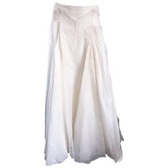 Stunning vintage CAROLINA HERRERA off-white/ivory ball skirt! Dramatic layers of chiffon and the finest silk faille make for an extra full skirt! Features hand-sewn chiffon patches on each panel. Slimming waist details. Hidden zipper up the side with hook-and-eye closure. The perfect skirt that looks great with a tailored blouse, turtleneck, or shell. In great condition. 100% Silk. Made in USA. Marked Size US 4 Measurements: 27 inch waist 36-38 inch hips 45 inches in length Long Silk Skirt, Low Rise Skirt, Cocktail Skirts, Ivory Skirt, White Long Skirt, Ball Skirt, Evening Skirts, Paneled Skirt, Pencil Skirt White