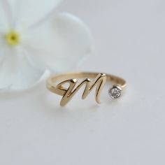 "Lower case alphabet ring, crafted in solid 14k or 18k gold, this personalized ring is a thoughtful gift for yourself and your loved ones. Customize with initials of your kids for a push present, spouse/partner to celebrate a milestone or anniversary or for Mother's Day, this ring is comfortable for everyday wear and solid. It makes for a great gift for pet parents and lovers too! Perfect to stack with other rings! *We will share a mock-up before starting the manufacturing process so you know what it will look like. * *  Gold: 14k / 18k Solid Gold  *  Gold Colour: Yellow / Rose / White  *  Gold Wt.: ~1.4 gm (14kt) *  Gemstone: Natural Genuine Diamond *  Diamond Wt.: ~0.03 Ct *  Color-Clarity: H-I, Vs-Si  * Authenticity Check: This ring will be marked for gold and will come with EGL (or equ Personalized Diamond Initial Ring, Diamond Monogram Initial Ring For Promise, Diamond Initial Ring For Promise, Personalized Luxury Diamond Ring For Anniversary, Luxury Personalized 14k Gold Diamond Ring, Promise Diamond Ring With Initials, Elegant Personalized Birthstone Ring For Anniversary Gift, Elegant Personalized Birthstone Ring For Anniversary, Anniversary Gift Birthstone Ring