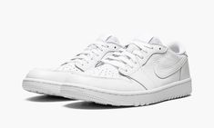 The Air Jordan 1 Low Golf “Triple White” is a monochromatic white colorway of the version of the vintage basketball shoe designed for golf.  The “Triple White” is one of multiple Jordan 1 Low Golf styles released by Jordan Brand in 2022.  Designed for the fairway, style elements include an all-white leather construction with a white leather Swoosh on the sides.  Tonal “Wings” branding is found on the heel.  Additional branding appears on the tongue tag, where a Jumpman and “Golf” detailing are f Classic White Low-top Golf Shoes, Classic White Custom Sneakers For Light Sports, Classic White Basketball Shoes, Sporty White Golf Shoes With Perforations, White Sporty Golf Shoes With Perforations, White Low-top Golf Shoes With Perforations, White Golf Shoes With Boost Midsole For Casual Wear, Vintage Basketball, Jordan 11 Retro Low