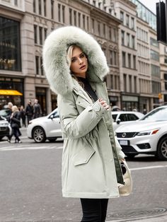 Fashionable and fierce, this coat is designed for those who want to stay warm without compromising on style. The soft faux fur-lined hood not only offers extra protection from the cold but also elevates the overall look of the coat. The cinched waistline provides a tailored, feminine fit, while the sleek front closure keeps the coat modern and functional. Ideal for both casual and formal settings, this coat can be styled with leather pants, jeans, or a chic dress, making it a versatile addition Black White Pink, Pants Jeans, Cotton Pads, Chic Dress, Winter Wardrobe, Jacket Style, Down Jacket, Stay Warm, Dress Making