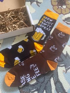 The perfect sock Hamper for that hard to buy person.  Includes; 1 x  socks  in size 6-8 U.K. sizing. They have coffee cups around the socks with the words "If you can read this bring me  coffee" 1 x  socks in size 6-8 U.K. sizing. They have beer jugs around them with wording up the leg part of the sock that reads "Brew, Enjoy, Empty, Repeat".  I post the same or next day to selling.  If you would like to send these as a gift I can add a gift tag.  Any questions please ask x Birthday Friend Gift, Beer Socks, Birthday Friend, Christmas Hamper, Socks Gift, Sock Gifts, Gift Hampers, Casual Socks, Gift Tag