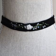 "Vintage Choker // Flower Choker // Black Velvet Choker // Black Flower Choker // Floral Necklace // Boho Jewelry This beautiful blossoming black velvet choker is created with vintage ribbon for an upcycled free-spirited modern look. The flower choker is created with hand embroidered floral motifs, glass beads and embellished with tiny colorful sequins for a pop of sparkle. The clamps on each side are gold plated brass and hold the ends of the velvet in place. The vintage flower choker comes wit Velvet Choker Aesthetic, Velvet Ribbon Necklace, Embroidered Choker, Whimsigoth Jewelry, Aesthetic Choker, Choker Ideas, Floral Goth, Choker Outfit, Fabric Choker