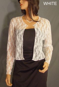 Comfortable and chic! Hip length Lace long sleeve bolero wedding jacket shrug. Perfect for anyone looking for a little extra coverage. Made From 40% Nylon & 60% Soft Rayon Lace Fabric To Give It A Nice Drape & The Stretchability To Last! Newly made in each size and ready to ship. VIEW PICTURES FOR SIZE AND MEASUREMENT CHART If you are needing more then four of this item just let us know. We are happy to offer VOLUME DISCOUNTS We keep several in each size in stock so that we can ship all Elegant Stretch Shrug For Spring, Spring Formal Fitted Shrug, Long Sleeve Shrug For Spring Weddings, White Chic Fitted Shrug, Fitted Formal Shrug For Fall, Elegant Fitted Shrug For Parties, Elegant Long Sleeve Stretch Shrug, White Stretch Long Sleeve Shrug, Elegant Long Sleeve Formal Shrug