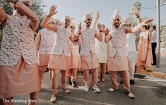 a group of people that are standing in the street