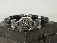 Unmissable! Check out this Saint George bracelet - Sterling silver 925 - Saint George slaying the dragon - Orthodox bracelet only at $375.00. #ChristianJewelry #MedievalJewelry #ReligiousBracelet #ChristianBracelet #MedievalKnightBracelet #StGeorgeDragonSlayerRing #YetiJewelry #SymbolOfCourageAndValor #SaintGeorge #SlayingTheDragon Saint George And The Dragon, Bold Statement Jewelry, Jewelry Stones, Biker Jewelry, Safe Box, Faith Gifts, Wooden Gift Boxes, Skull Bracelet, Skull Pendant