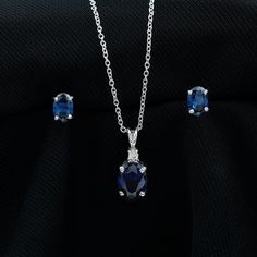 Product Details Introducing our remarkable jewelry set, featuring a pendant necklace adorned with an oval-shaped created blue sapphire, elegantly complemented by a round moissanite accent. Accompanying this stunning pendant are a pair of earrings showcasing oval created blue sapphires. Prepare to steal the spotlight with this truly enchanting collection. Product Information SKU SHP-PENDANT012148436 Length 12 mm Width 6 mm Weight 3.04 gm (Approximate) LAB CREATED BLUE SAPPHIRE INFORMATION No.of S Blue Sapphire Pendant, Steal The Spotlight, Sapphire Solitaire, Sapphire Pendant, Signature Jewelry, Round Moissanite, Timeless Jewelry, Conflict Free Diamonds, Free Jewelry