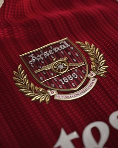 the crest on this jersey is gold and red