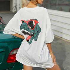 Dinosaur Print Drop Shoulder Oversized Tee Size: Xs Bust: 47.2 Inch Length: 31.5 Inch Sleeve Length: 8.3 Inch Dinosaur Print Graphic Tee For Summer, Graphic Tee With Dinosaur Print For Summer, Summer Dinosaur Print Graphic Tee, Dinosaur Print Relaxed Fit Tops For Summer, Relaxed Fit Dinosaur Print Top For Summer, Summer Dinosaur Print Relaxed Fit Tops, Casual Dinosaur Print T-shirt For Summer, Casual Dinosaur Print Tops For Streetwear, Casual Summer T-shirt With Dinosaur Print