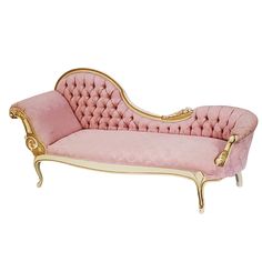 a pink and gold chaise lounger with golden trimmings on the legs