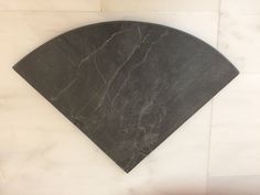 a black and white marble design on the wall