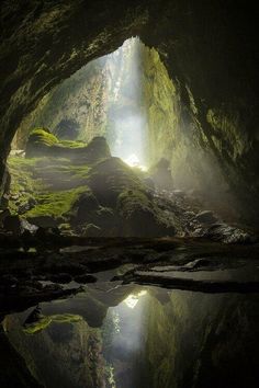 the light at the end of the tunnel shines brightly into the dark water below