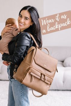 a woman holding a baby in her arms with the words, the radleyy in toffe