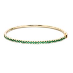 Intrigue her with the subtle yet charming radiance of this fashion bangle. Fashioned in sterling silver with 14K gold plate, this chic design features a row of lab-created verdant-green emeralds. Buffed to a brilliant luster, this hinged bangle bracelet measures 7.0-inches in circumference and slips on and off for easy wear. Lab Created Emerald, Bangles Style, Gold Plated Bracelets, Emerald Stone, Hinged Bangle, Fashion Accessories Jewelry, Gemstone Bracelets, Women Accessories Jewelry, Chic Design