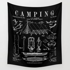 a black and white wall hanging with an illustration of camping equipment