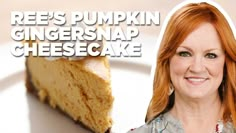 a woman with red hair is smiling next to a piece of cheesecake