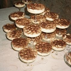 there are many desserts on the table ready to be eaten and served for guests