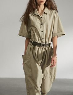 Tan oversized baggy jumpsuit . 100% cottonElastic back waistBelt loopsLarge side pocketsBust 50"/128 cmHips 50"/ 128 cm Waist Total length 55"/145 cmModel wears one size and is 5.8"/170 cmImported Oversized Cotton Jumpsuits And Rompers In Solid Color, Khaki Short Sleeve Jumpsuits And Rompers With Pockets, Short Sleeve Khaki Jumpsuits And Rompers With Pockets, Khaki Short Sleeve Jumpsuit With Pockets, Oversized Solid Jumpsuits And Rompers With Pockets, Utility Relaxed Fit Jumpsuit In Solid Color, Utility Style Jumpsuits And Rompers With Relaxed Fit, Oversized Jumpsuits And Rompers For Summer, Oversized Cotton Jumpsuits And Rompers With Pockets