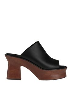 Modern Clogs With Rubber Sole And Open Heel, Modern Open Heel Clogs With Rubber Sole, Leather Platform Heels Slip-on, Modern Slip-on Leather Heels, Modern Leather Slip-on Heels, Modern Clogs With Wooden Open Heel, Spring Leather Platform Slippers With Wooden Heel, Modern Mules With Rubber Heel Cap And Round Toe, Modern Leather Mules With Round Toe