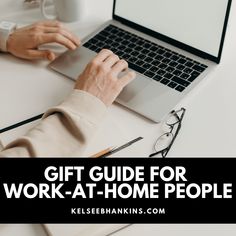 a person typing on a laptop with the words gift guide for work - at - home people