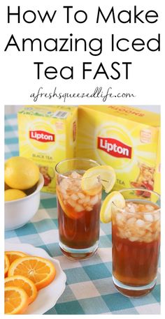 two glasses filled with iced tea and lemons on top of a checkered table cloth