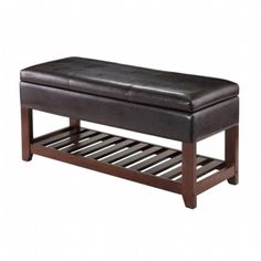 a wooden bench with a black leather seat on it's bottom shelf for storage