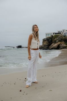 We went on a search for the perfect drawstring linen pants, and WE FOUND THEM. These are so versatile, lightweight, comfy and the highest quality. They are 100% linen which means they are durable and will last you a lifetime! You will be living in these pants for years! Model Info: Taylor is 5'9 wearing size Small. Paired With: Capri Knit Vest Top Also available in Black: Bondi Linen Pants // Black Fabric Info: 100% Linen Linen Drawstring Pants, Knit Vest, Vest Top, Linen Pants, Black Fabric, Best Sellers, Set Dress, Black Pants, Lounge Wear