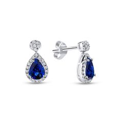 "Natural Sapphire Drop Earrings/ Sapphire Diamonds Halo Stud Earrings/ Pear Cut Blue Sapphire Diamond Earrings/ Engage Wedding Jewelry Gift Our designs are based on colors of life and each color identifies a motion, a feeling, an emotion and style in each person's life. Blue Sapphire, which has been treasured by royal families around the world for centuries, said to be symbol of Love, Power, Loyalty and Wisdom they say. 7x5MM Pear Shape Blue Sapphire with round diamonds on the sides, this lovely gemstone earrings will be your favorite Minimalist White Gold Earrings. Go with your heart and find your own meaning in this special minimalist design produced with Blue Sapphire. Also good news is this model has a set with its pendant, which you can find in our page. ╰► Specifications ➤ Made to Or Blue Pear-shaped Diamond Earrings For Anniversary, Sapphire Pear-shaped Sterling Silver Earrings, Pear-shaped Sapphire Sterling Silver Earrings, Blue Sapphire Pear-shaped Earrings, Luxury Pear-shaped Sapphire Earrings, Sapphire Drop Earrings, Mom Gifts Jewelry, Earrings Sapphire, Halo Stud Earrings