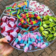 a platter filled with lots of different colored candies