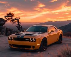 an orange and black car parked on top of a dirt road